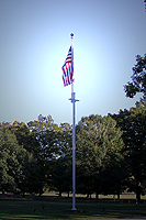 Click to enlarge photo of Flag Flying in front of Presidential Library.